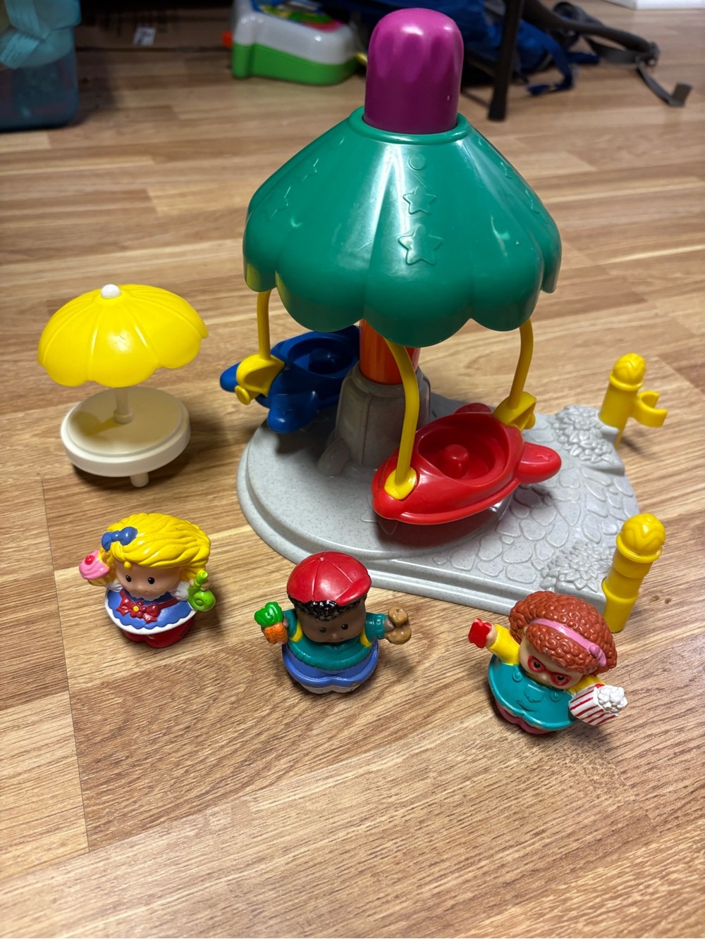 Fisher-Price little people Carousel Playset with Red, Yellow & Blue Accents